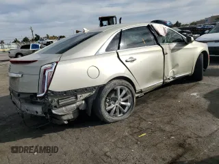 2014 Cadillac XTS Luxury with VIN 2G61M5S31E9314477, listed as a Copart auction lot 43562705 with 136,469 mi miles and Salvage Title. Bid and sale history available at DreamBid. Image 3.