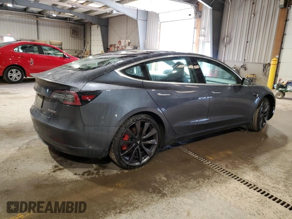 2020 Tesla Model 3 Performance z VIN 5YJ3E1EC8LF640891, wystawiony jako Copart lot #52377615 z przebiegiem 77 343 mil mil oraz Szkoda całkowita • Salvage title. Historia ofert i sprzedaży dostępna na DreamBid. Obrazek 3.