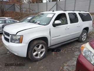 2008 Chevrolet Suburban LTZ with VIN 3GNFK16358G178819, listed as a IAAI auction lot 41511544 with 184,718 mi miles. Bid and sale history available at carsss.com. Image 2.