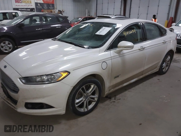 2016 Ford Fusion Titanium with VIN 3FA6P0SU8GR259163, listed as a IAAI auction lot 41812294 with 151,002 mi miles and . Bid and sale history available at DreamBid. Image 17.