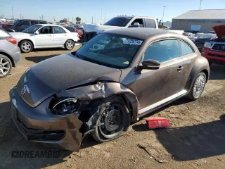 2015 Volkswagen Beetle with VIN 3VWH17AT3FM604193, listed as a Copart auction lot 72023304 with 49,958 mi miles and Salvage Title. Bid and sale history available at DreamBid. Image 1.