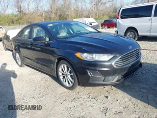 2020 Ford Fusion SE z VIN 3FA6P0LU9LR226536, wystawiony jako IAAI lot #41981523 z przebiegiem 115 390 mil mil oraz . Historia ofert i sprzedaży dostępna na DreamBid. Obrazek 1.