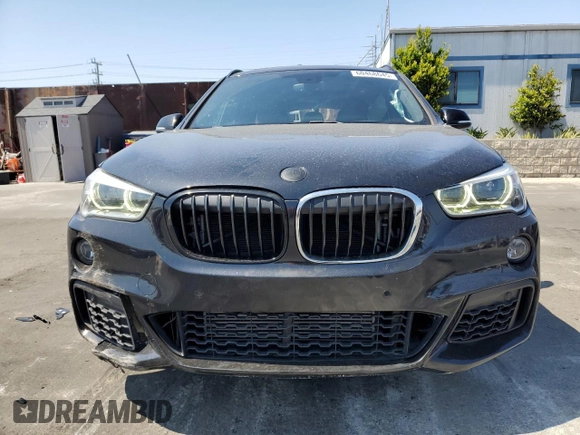 2018 BMW X1 xDrive28i z VIN WBXHT3C33J5L24441, wystawiony jako Copart lot #60468645 z przebiegiem 83 339 mil mil oraz Szkoda całkowita • Salvage title. Historia ofert i sprzedaży dostępna na DreamBid. Obrazek 5.