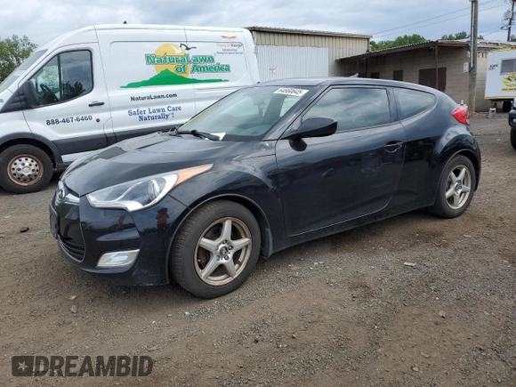 2013 Hyundai Veloster w/Gray Int z VIN KMHTC6AD9DU110094, wystawiony jako Copart lot #64660645 z przebiegiem 149 746 mil mil oraz Szkoda całkowita • Salvage title. Historia ofert i sprzedaży dostępna na DreamBid. Obrazek 1.