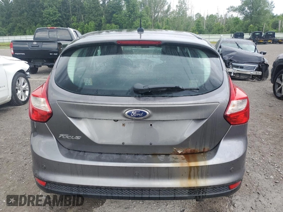 2014 Ford Focus Titanium with VIN 1FADP3N20EL329415, listed as a Copart auction lot 60881115 with 97,382 mi miles and Salvage title. Bid and sale history available at DreamBid. Image 6.
