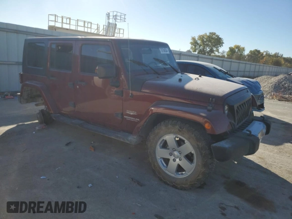 2010 Jeep Wrangler Unlimited Sahara with VIN 1J4BA5H1XAL196555, listed as a Copart auction lot 76704534 with 112,365 mi miles and Salvage Title. Bid and sale history available at carsss.com. Image 4.