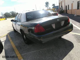 2010 Ford Police Interceptor with VIN 2FABP7BV1AX131372, listed as a IAAI auction lot 41501557 with 131,632 mi miles. Bid and sale history available at carsss.com. Image 3.