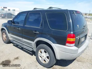 2001 Ford Escape XLT with VIN 1FMYU03141KF43980, listed as a IAAI auction lot 41989002 with 222,344 mi miles. Bid and sale history available at carsss.com. Image 3.