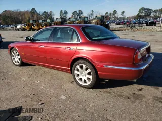 2004 Jaguar XJ VDP with VIN SAJWA74C14SG25722, listed as a Copart auction lot 84757994 with 62,152 mi miles and Salvage Title. Bid and sale history available at carsss.com. Image 2.
