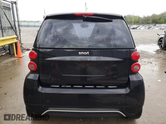 2013 Smart fortwo Pure z VIN WMEEJ3BA0DK671030, wystawiony jako Copart lot #53307075 z przebiegiem 57 779 mil mil oraz Szkody całkowita. Historia ofert i sprzedaży dostępna na DreamBid. Obrazek 6.