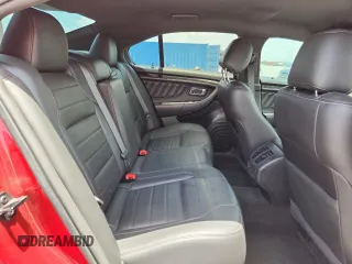 2015 Ford Taurus SHO with VIN 1FAHP2KTXFG130133, listed as a Copart auction lot 60019955 with 92,527 mi miles and Salvage title. Bid and sale history available at DreamBid. Image 10.