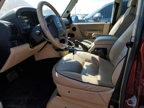 2004 Land Rover Discovery SE with VIN SALTY19474A860231, listed as a Copart auction lot 69286094 with 148,059 mi miles and Salvage Title. Bid and sale history available at carsss.com. Image 7.