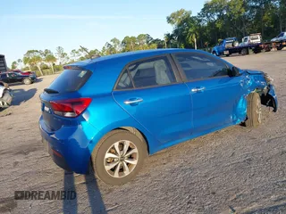 2022 Kia Rio S with VIN 3KPA25AD6NE483733, listed as a IAAI auction lot 41850498 with 50,035 mi miles and . Bid and sale history available at DreamBid. Image 4.