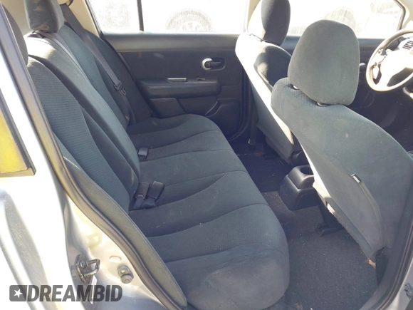 2012 Nissan Versa S with VIN 3N1BC1CP8CK242212, listed as a IAAI auction lot 42027327 with 117,118 mi miles. Bid and sale history available at carsss.com. Image 8.