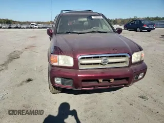 2003 Nissan Pathfinder LE z VIN JN8DR09Y63W835297, wystawiony jako Copart lot #76980904 z przebiegiem 254 778 mil mil oraz Szkoda całkowita • Salvage title. Historia ofert i sprzedaży dostępna na DreamBid. Obrazek 12.