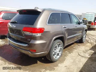 2020 Jeep Grand Cherokee Overland with VIN 1C4RJECG8LC323824, listed as a IAAI auction lot 41757922 with 64,792 mi miles. Bid and sale history available at carsss.com. Image 4.