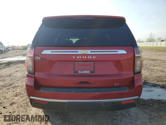 2022 Chevrolet Tahoe LT with VIN 1GNSCNKD0NR105015, listed as a Copart auction lot 46949255 with 28,434 mi miles and Salvage title. Bid and sale history available at DreamBid. Image 6.