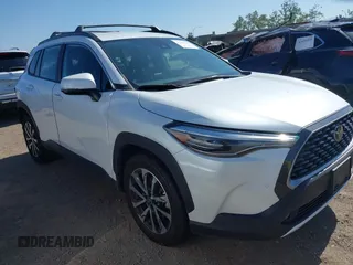 2022 Toyota Corolla Cross XLE with VIN 7MUEAAAG4NV027314, listed as a IAAI auction lot 42701907 with 30,275 mi miles and . Bid and sale history available at DreamBid. Image 1.