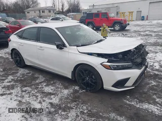 2023 Honda Civic Sport z VIN 19XFL2H89PE008381, wystawiony jako IAAI lot #41443683 z przebiegiem Nie podano mil oraz . Historia ofert i sprzedaży dostępna na DreamBid. Obrazek 1.