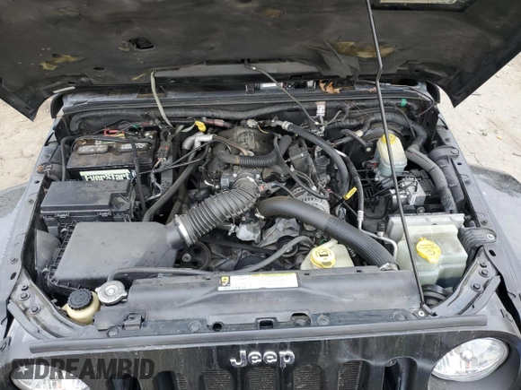 2008 Jeep Wrangler Unlimited Sahara with VIN 1J4GA59148L574934, listed as a Copart auction lot 74590164 with 134,674 mi miles and Salvage title. Bid and sale history available at DreamBid. Image 12.