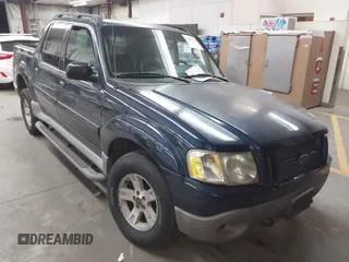 2003 Ford Explorer Sport Trac XLS z VIN 1FMDU77E03UC07089, wystawiony jako IAAI lot #41938966 z przebiegiem 128 982 mil mil oraz . Historia ofert i sprzedaży dostępna na DreamBid. Obrazek 1.