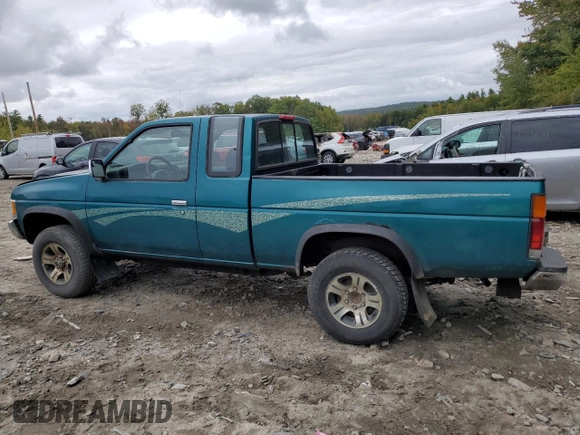 1997 Nissan Frontier XE with VIN 1N6SD16Y0VC329686, listed as a Copart auction lot 73103584 with 105,657 mi miles and Salvage title. Bid and sale history available at DreamBid. Image 2.