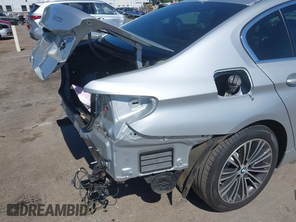 2019 BMW 5 Series 530i with VIN WBAJA5C5XKWW07106, listed as a IAAI auction lot 41977982 with 65,371 mi miles and . Bid and sale history available at carsss.com. Image 18.