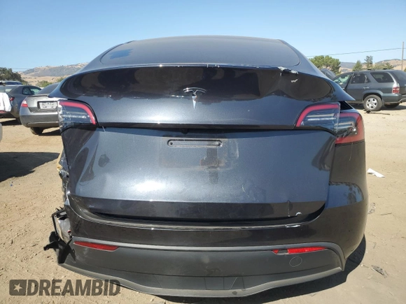 2024 Tesla Model Y with VIN 7SAYGDED0RF125308, listed as a Copart auction lot 61614675 with 11,608 mi miles and Salvage title. Bid and sale history available at DreamBid. Image 6.