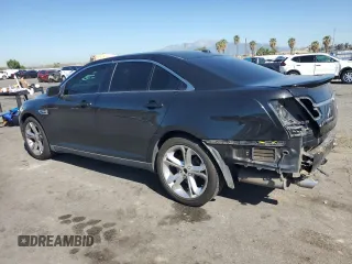 2011 Ford Taurus SHO with VIN 1FAHP2KT2BG114440, listed as a Copart auction lot 56431635 with 126,484 mi miles and Salvage title. Bid and sale history available at DreamBid. Image 2.