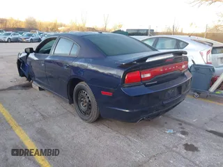 2014 Dodge Charger SXT with VIN 2C3CDXHGXEH330845, listed as a IAAI auction lot 41858714 with 161,541 mi miles. Bid and sale history available at carsss.com. Image 3.