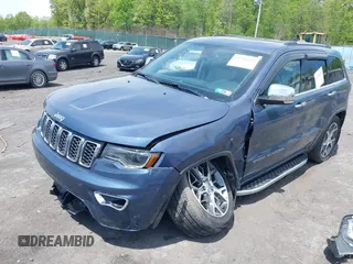 2021 Jeep Grand Cherokee 80th Anniversary with VIN 1C4RJFBGXMC775539, listed as a IAAI auction lot 42241659 with 23,541 mi miles and . Bid and sale history available at DreamBid. Image 6.