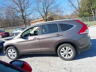 2014 Honda CR-V EX-L with VIN 2HKRM4H79EH684688, listed as a IAAI auction lot 41785089 with 106,951 mi miles. Bid and sale history available at carsss.com. Image 14.