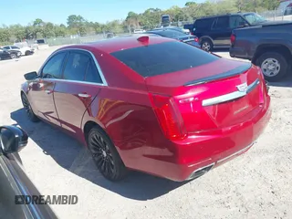 2016 Cadillac CTS Luxury Collection AWD with VIN 1G6AX5SXXG0100952, listed as a IAAI auction lot 41736200 with 123,495 mi miles and . Bid and sale history available at DreamBid. Image 3.
