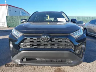 2019 Toyota RAV4 XLE with VIN JTMW1RFV1KD002799, listed as a IAAI auction lot 40887562 with 75,016 mi miles. Bid and sale history available at carsss.com. Image 12.