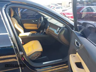 2018 Volvo XC60 Momentum with VIN YV4A22RK3J1040015, listed as a IAAI auction lot 42098399 with 57,130 mi miles and . Bid and sale history available at DreamBid. Image 5.