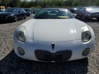 2008 Pontiac Solstice z VIN 1G2MC35B58Y123587, wystawiony jako Copart lot #52017005 z przebiegiem Nie podano mil oraz Szkoda całkowita • Salvage title. Historia ofert i sprzedaży dostępna na DreamBid. Obrazek 5.