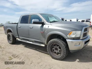 2012 Ram 2500 Laramie with VIN 3C6UD5FL4CG250594, listed as a Copart auction lot 52042365 with 233,777 mi miles and Salvage Title. Bid and sale history available at carsss.com. Image 4.