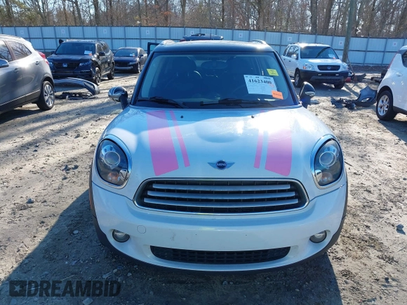 2012 MINI Countryman with VIN WMWZB3C50CWM30524, listed as a IAAI auction lot 41623400 with 194,858 mi miles and . Bid and sale history available at DreamBid. Image 12.