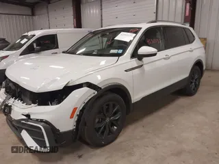 2024 Volkswagen Tiguan SE with VIN 3VVMB7AX6RM135219, listed as a IAAI auction lot 42311133 with 7,885 mi miles and . Bid and sale history available at DreamBid. Image 2.