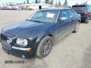 2006 Chrysler 300 C with VIN 2C3LA63H06H537426, listed as a IAAI auction lot 41896073 with 282,028 mi miles and . Bid and sale history available at carsss.com. Image 2.