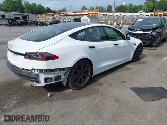 2022 Tesla Model S with VIN 5YJSA1E57NF462175, listed as a IAAI auction lot 42231439 with Not provided miles and . Bid and sale history available at DreamBid. Image 4.