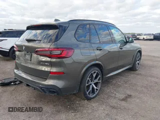2021 BMW X5 xDrive45e with VIN 5UXTA6C01M9H19575, listed as a IAAI auction lot 40817408 with 37,724 mi miles. Bid and sale history available at carsss.com. Image 4.