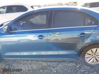 2017 Volkswagen Jetta 1.4T S with VIN 3VW2B7AJ5HM317846, listed as a IAAI auction lot 41755207 with 128,318 mi miles. Bid and sale history available at carsss.com. Image 14.