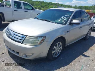 2008 Ford Taurus SEL z VIN 1FAHP24W28G186822, wystawiony jako IAAI lot #42173076 z przebiegiem 243 849 mil mil oraz . Historia ofert i sprzedaży dostępna na DreamBid. Obrazek 2.