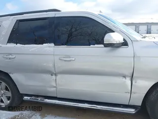 2018 Ford Expedition XLT with VIN 1FMJU1HT0JEA65668, listed as a IAAI auction lot 41005737 with 141,642 mi miles. Bid and sale history available at carsss.com. Image 13.