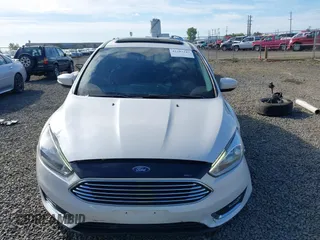 2017 Ford Focus Titanium with VIN 1FADP3N24HL308751, listed as a IAAI auction lot 42207247 with 109,736 mi miles and . Bid and sale history available at DreamBid. Image 13.