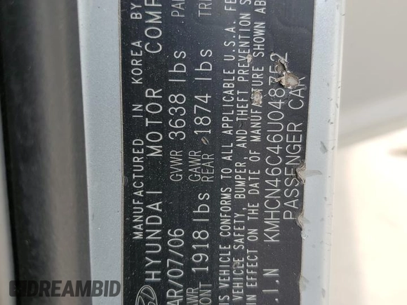 2006 Hyundai Accent GLS with VIN KMHCN46C46U048752, listed as a Copart auction lot 52930035 with 143,688 mi miles and Salvage title. Bid and sale history available at DreamBid. Image 12.