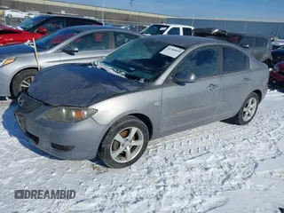 2006 Mazda 3 i Touring with VIN JM1BK32F961521985, listed as a IAAI auction lot 41360059 with 221,961 mi miles and . Bid and sale history available at DreamBid. Image 2.