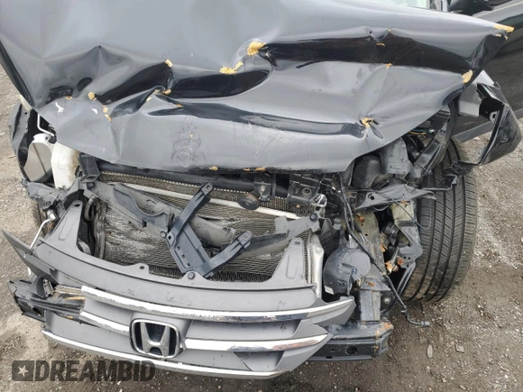 2014 Honda CR-V EX z VIN 2HKRM4H59EH702086, wystawiony jako Copart lot #57152195 z przebiegiem 92 066 mil mil oraz Szkoda całkowita • Salvage title. Historia ofert i sprzedaży dostępna na DreamBid. Obrazek 12.