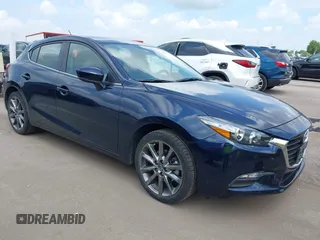 2018 Mazda 3 Touring with VIN 3MZBN1L39JM204670, listed as a IAAI auction lot 42530134 with 35,097 mi miles and . Bid and sale history available at DreamBid. Image 1.